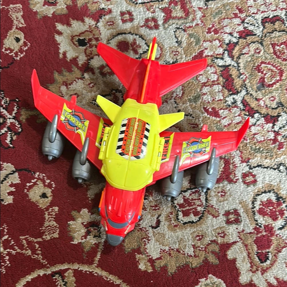 Futuristic Red and Yellow Toy Car with Wing-like Structures